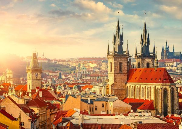 illustration of a romantic European cityscape with historical buildings and warm sunset tones