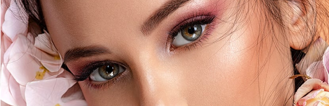 Close-up on glamorous model eyes, symbolizing elegance and mystery of elite travel companions