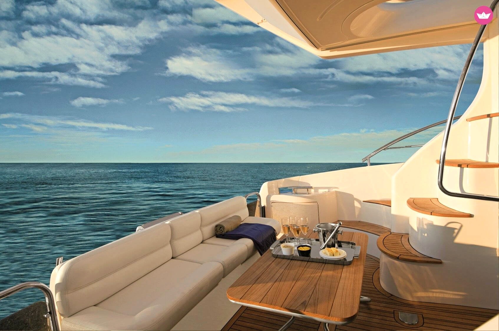 Elegant seaside view with champagne and sunset — perfect scene for luxury dating while traveling