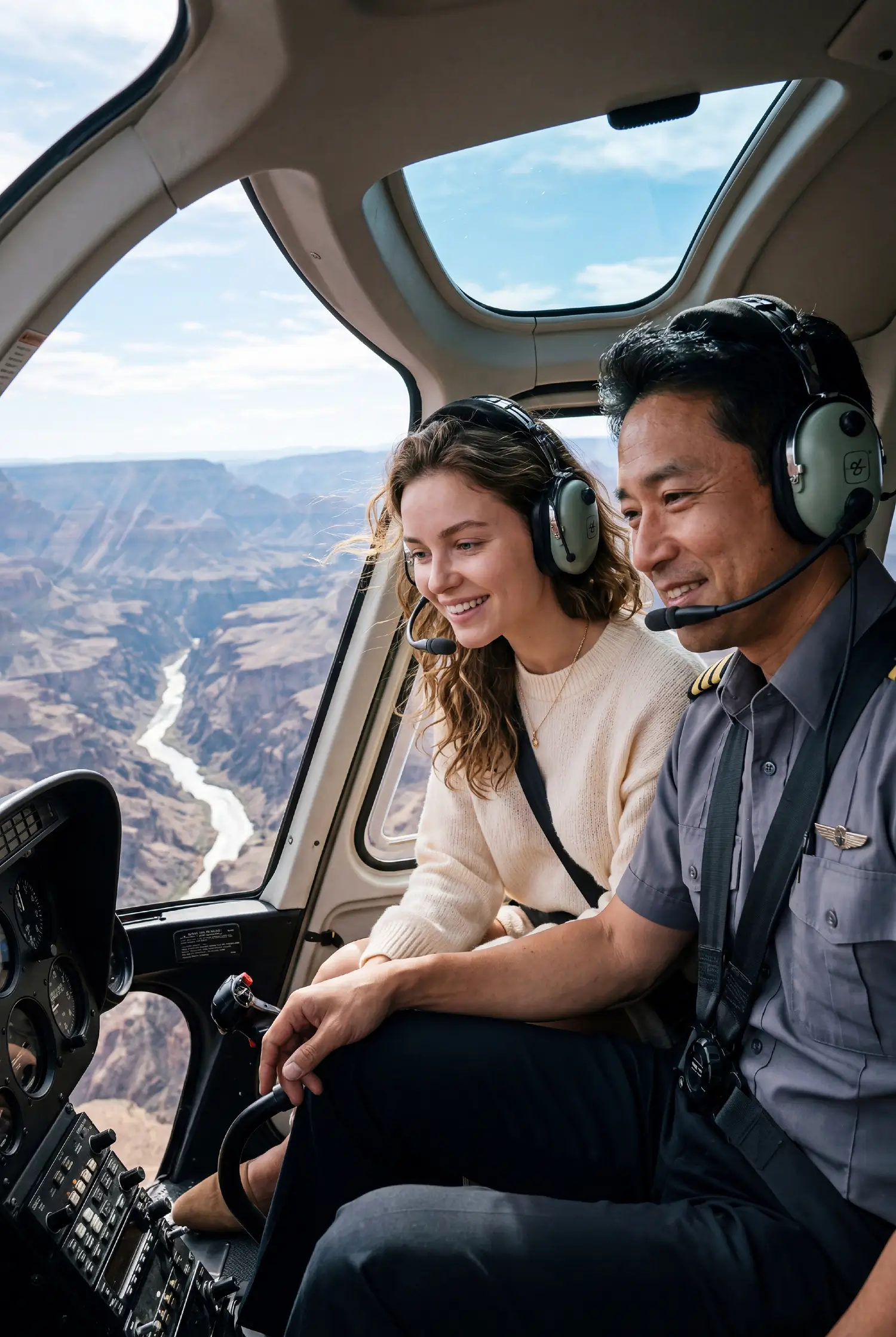 Luxury couple in helicopter enjoying aerial travel experience